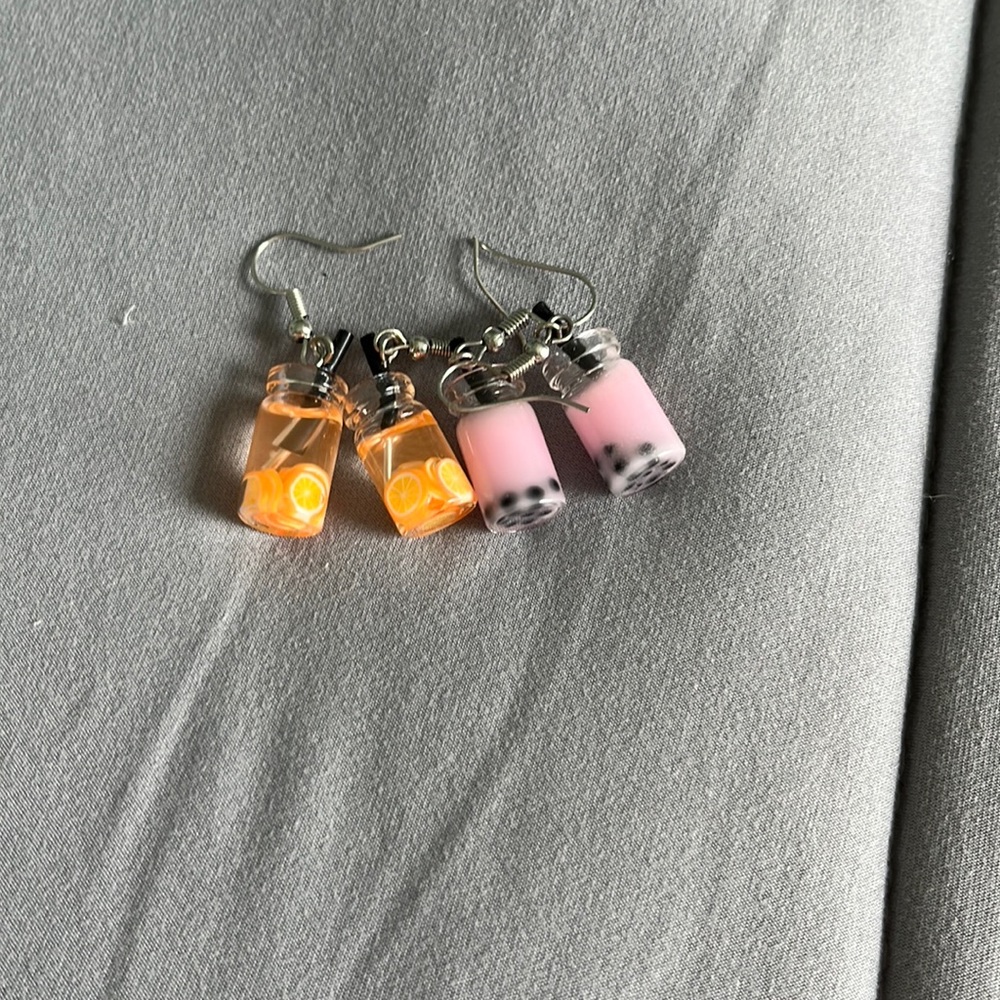 2 pack of pink boboa and orange juice earrings
